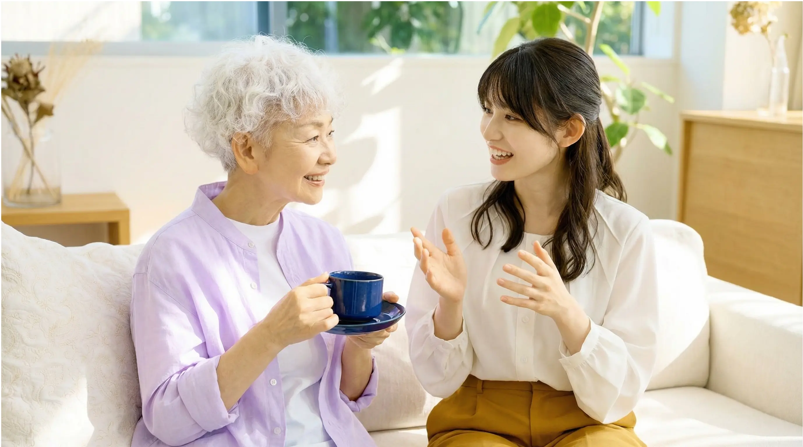 夫婦の話し合いがうまくいかず、スタッフが見守る場面